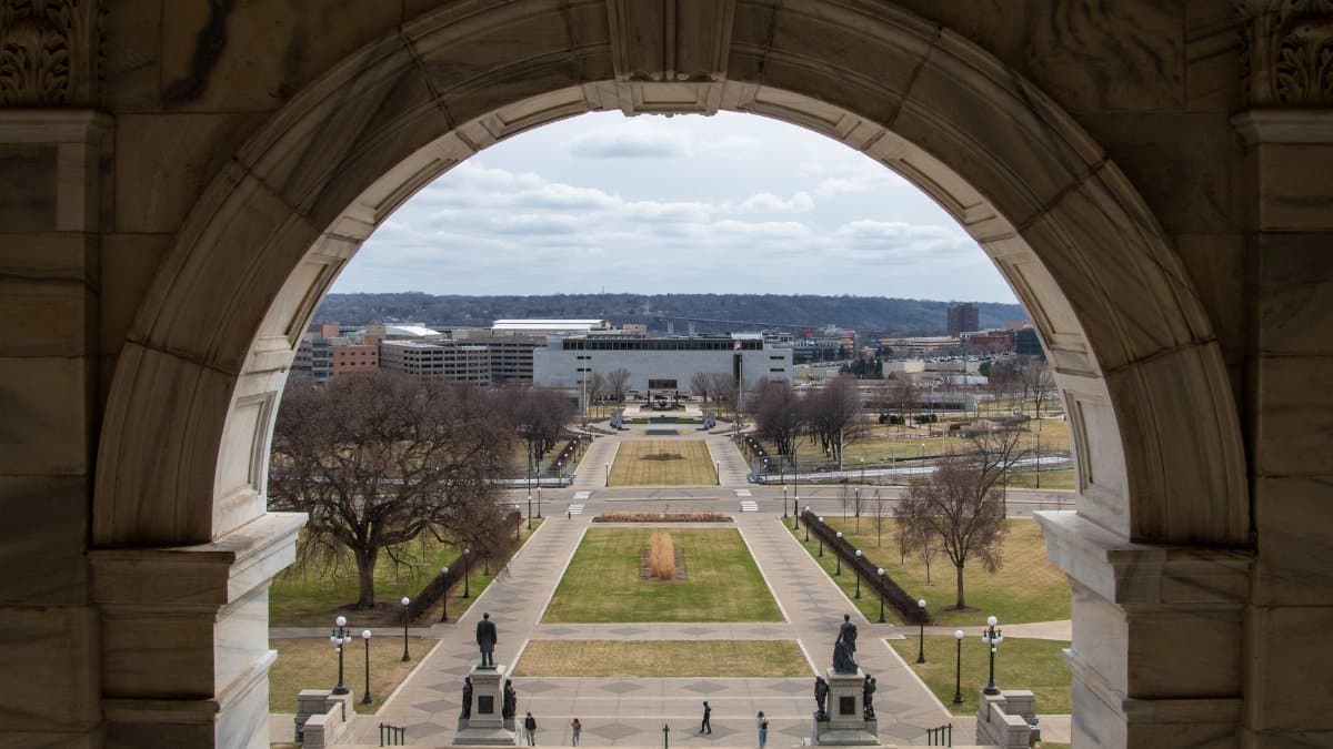 A scenic view through an arch at the State Capitol in Saint Paul, Minnesota during the day.