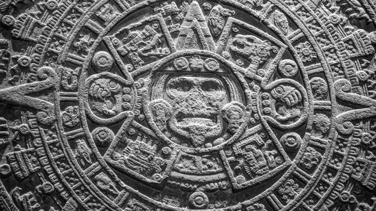 Close-up of the Aztec calendar stone, showcasing ancient craftsmanship and cultural significance in Mexico City.
