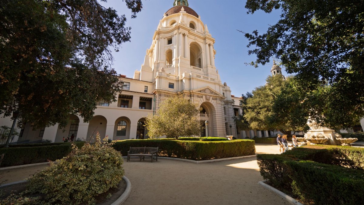 Elegant view of Pasadena City Hall with lush gardens on a sunny day.