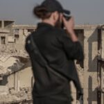 A photographer captures the crumbling ruins of war-torn Damascus, Syria.