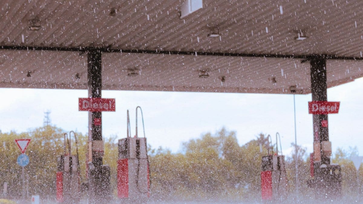 A gas station in Dallgow-Döberitz, Germany, during a rainy day.