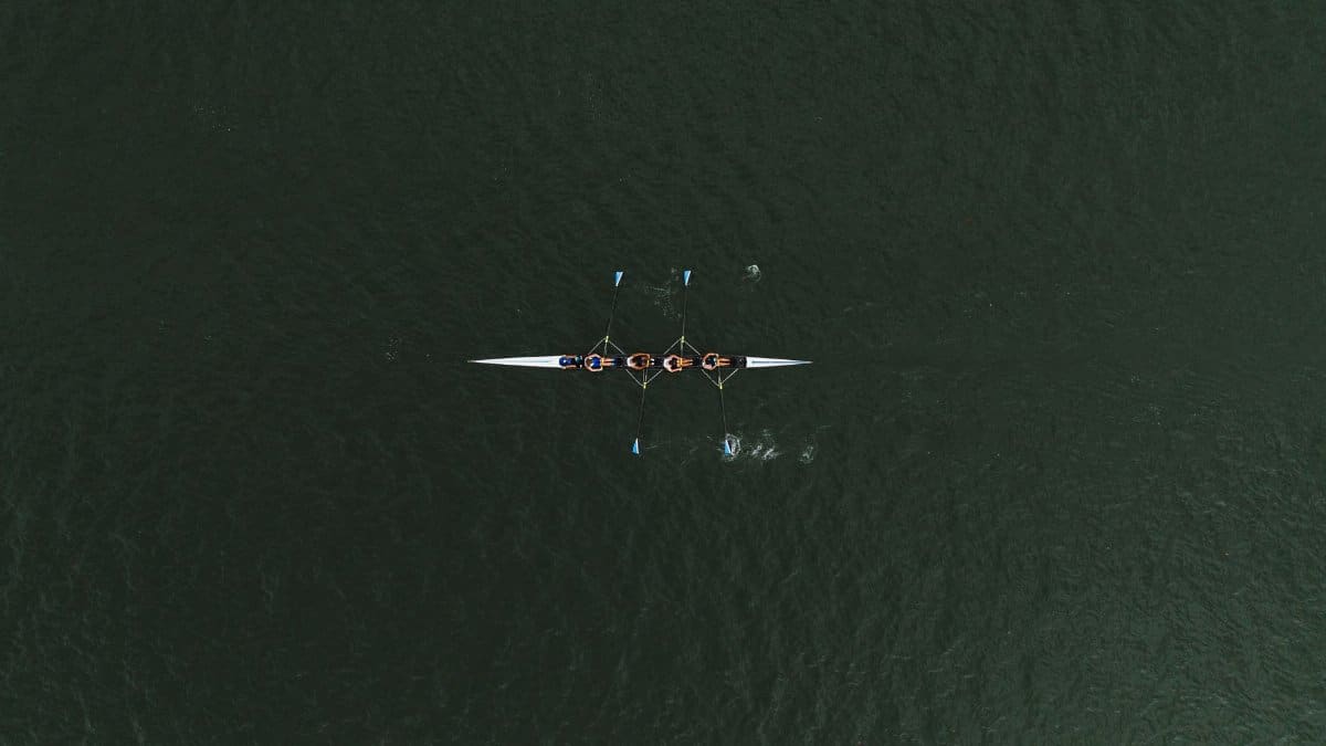 Aerial shot of a rowing team on a river in Chattanooga, TN, USA.