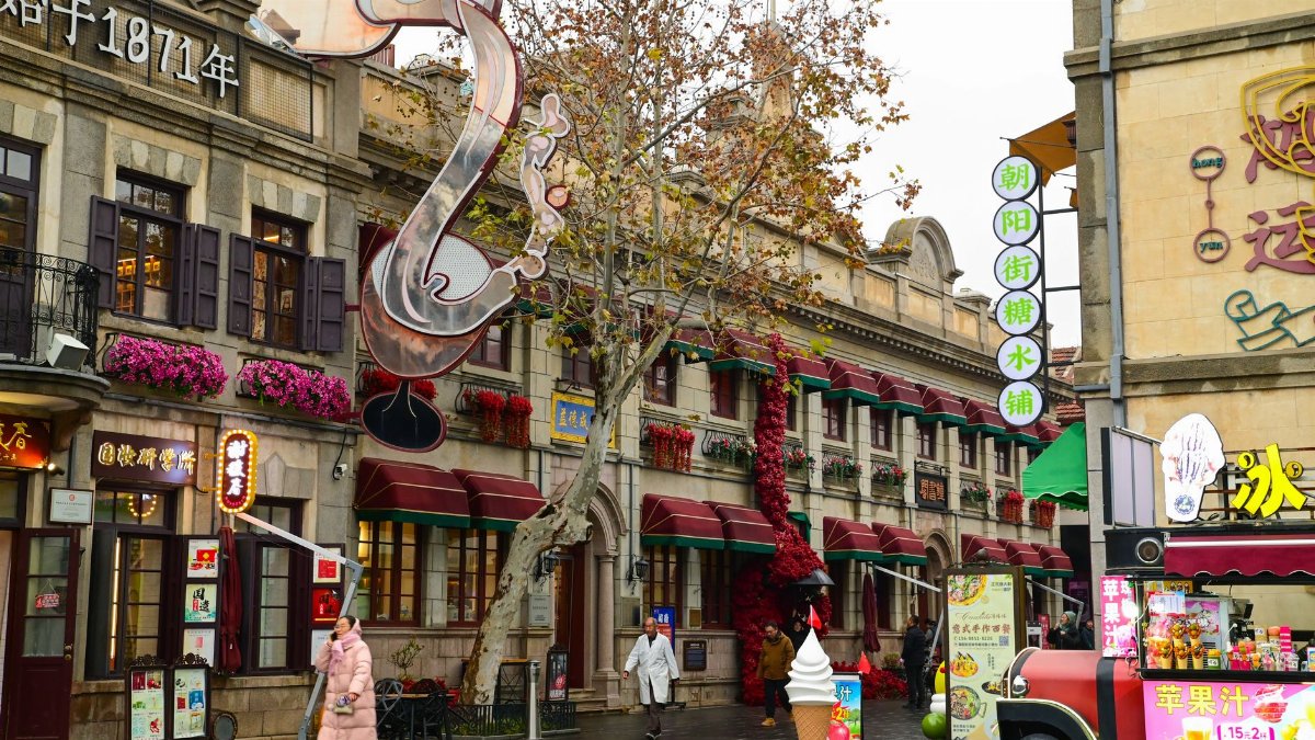 Yantai street view showcasing European-style architecture on a cloudy day.
