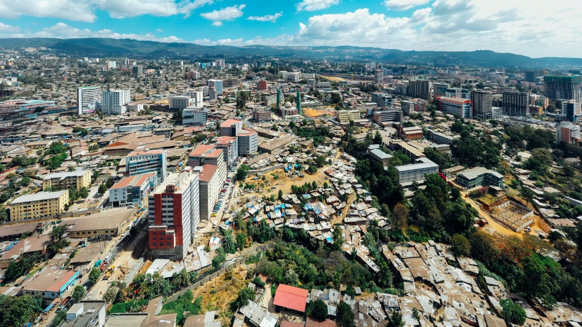 A stunning aerial shot showcasing Nairobi's skyline, balancing urban architecture with natural landscapes.
