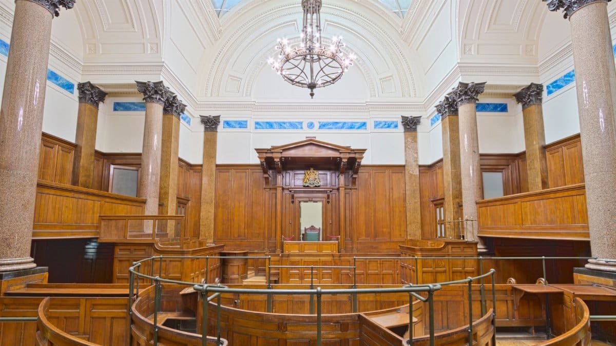Interior view of the historic courtroom in St George's Hall, Liverpool, showcasing elegant architecture.