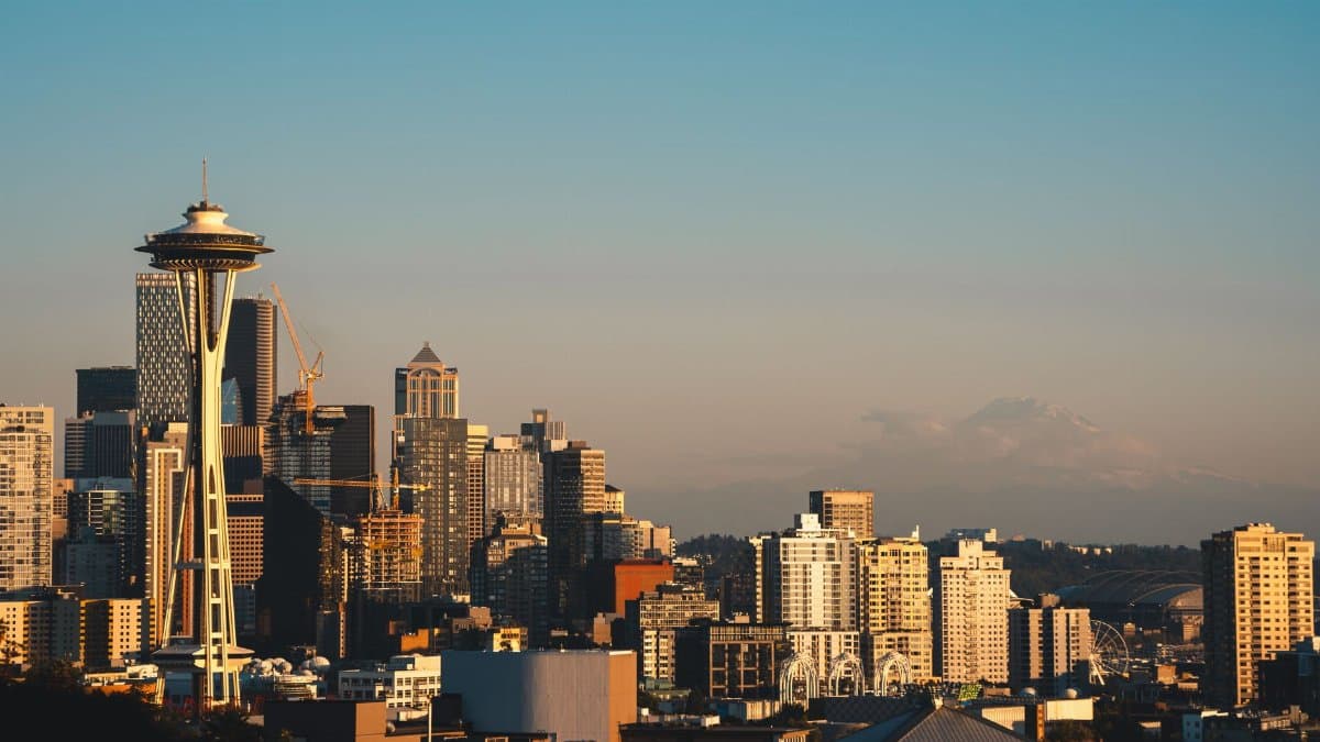 Stunning view of Seattle's skyline featuring the iconic Space Needle during sunset.
