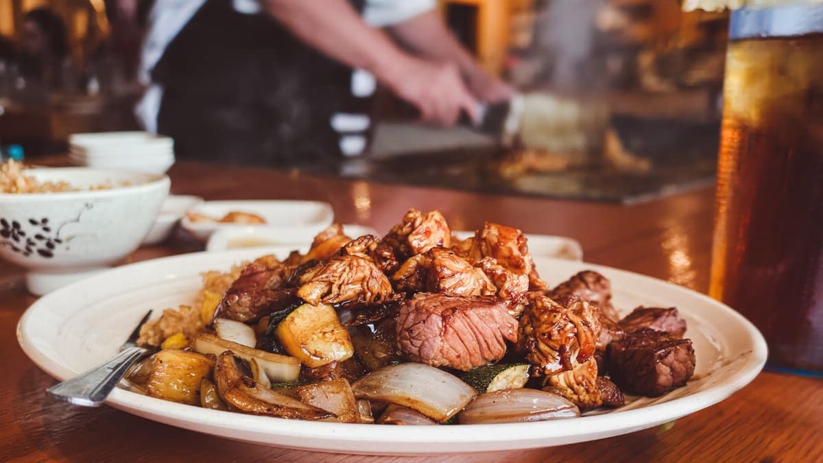 Delicious Japanese teppanyaki meal with grilled steak and vegetables in Kansas City.