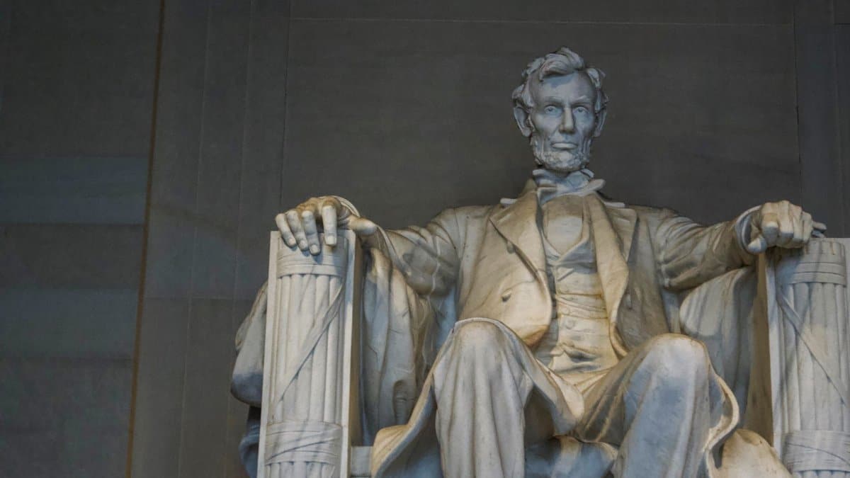 Low angle of marble colossal seated figure of United States President located in city memorial complex