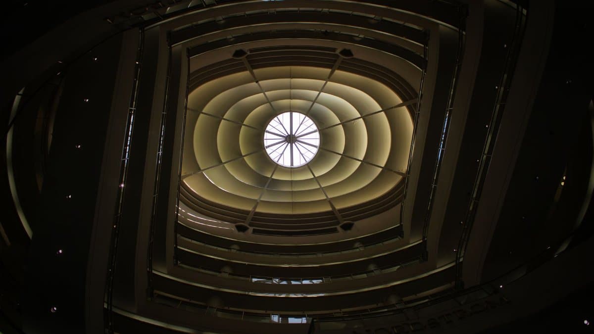 View of the round skylight and modern architecture inside San Francisco Centre.