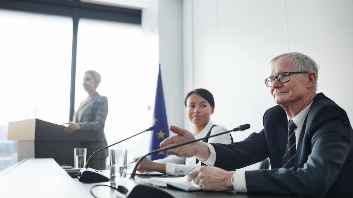 Panelists at an EU conference discussing law and diplomacy.