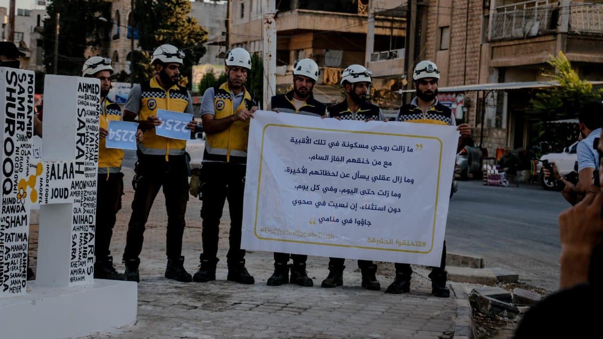 Humanitarian workers protest for safety in Idlib, Syria.