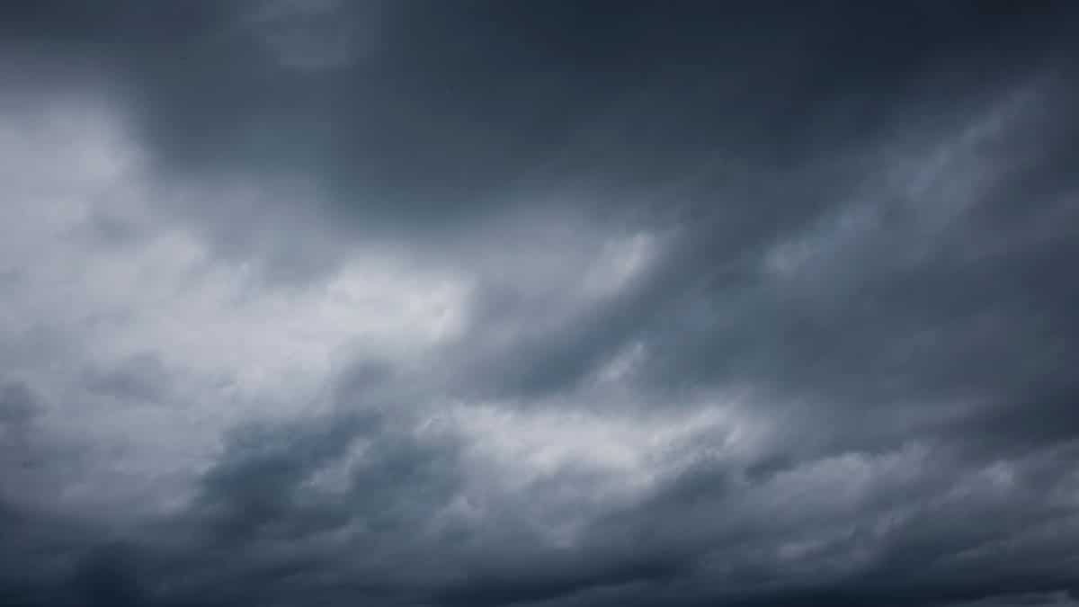 Dark and moody sky filled with stormy, overcast clouds, signaling incoming rain or storm.