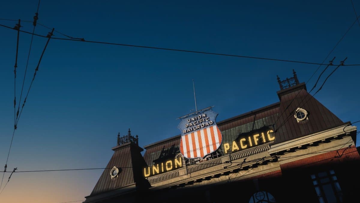 Union Pacific Railroad station front during twilight showcasing iconic logo.