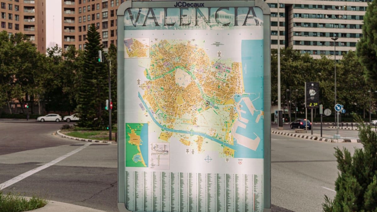 Street map display in Valencia city with urban background.