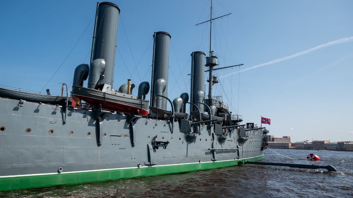 Side view of the historic cruiser Aurora docked in Saint Petersburg, Russia.