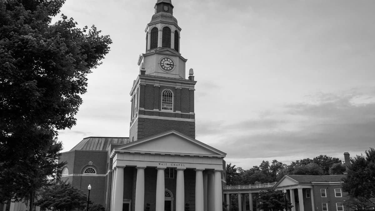 A black and white photo of Wait Chapel, iconic architecture at Wake Forest University.