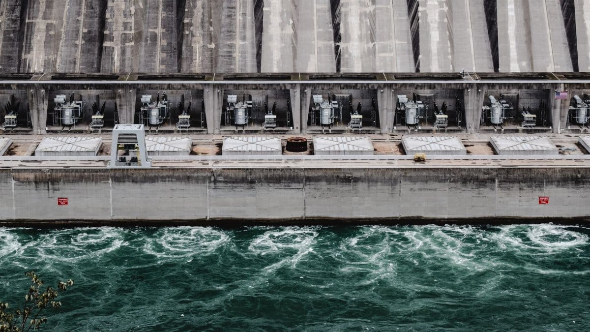 A stunning aerial view of the hydro power plant at Niagara Falls, showcasing engineering marvels and rushing water.