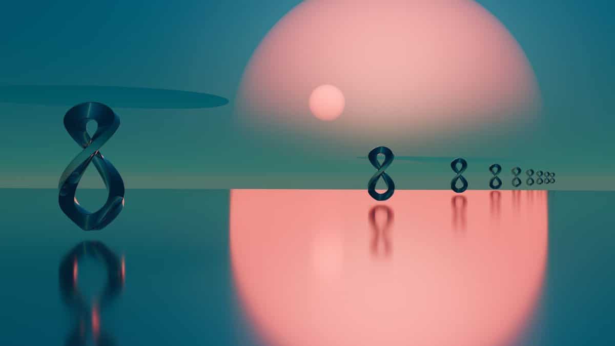Surreal abstract scene with metal loops reflecting on water at sunset.