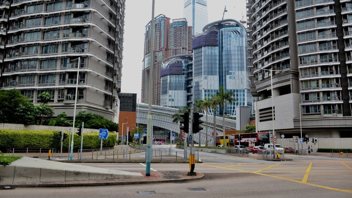 Contemporary cityscape featuring skyscrapers in Kowloon, Hong Kong. Urban architecture and street view.