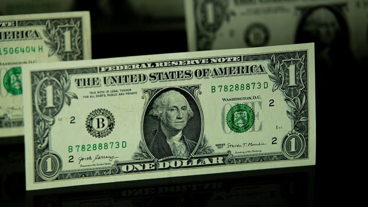 Detailed shot of a one dollar bill highlighting currency and finance themes.
