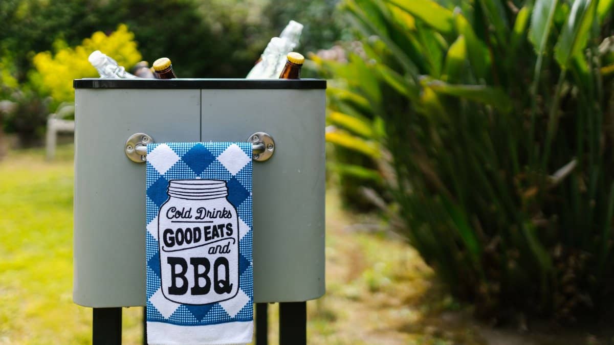 Stylish outdoor cooler filled with drinks, perfect for summer BBQs and picnics.