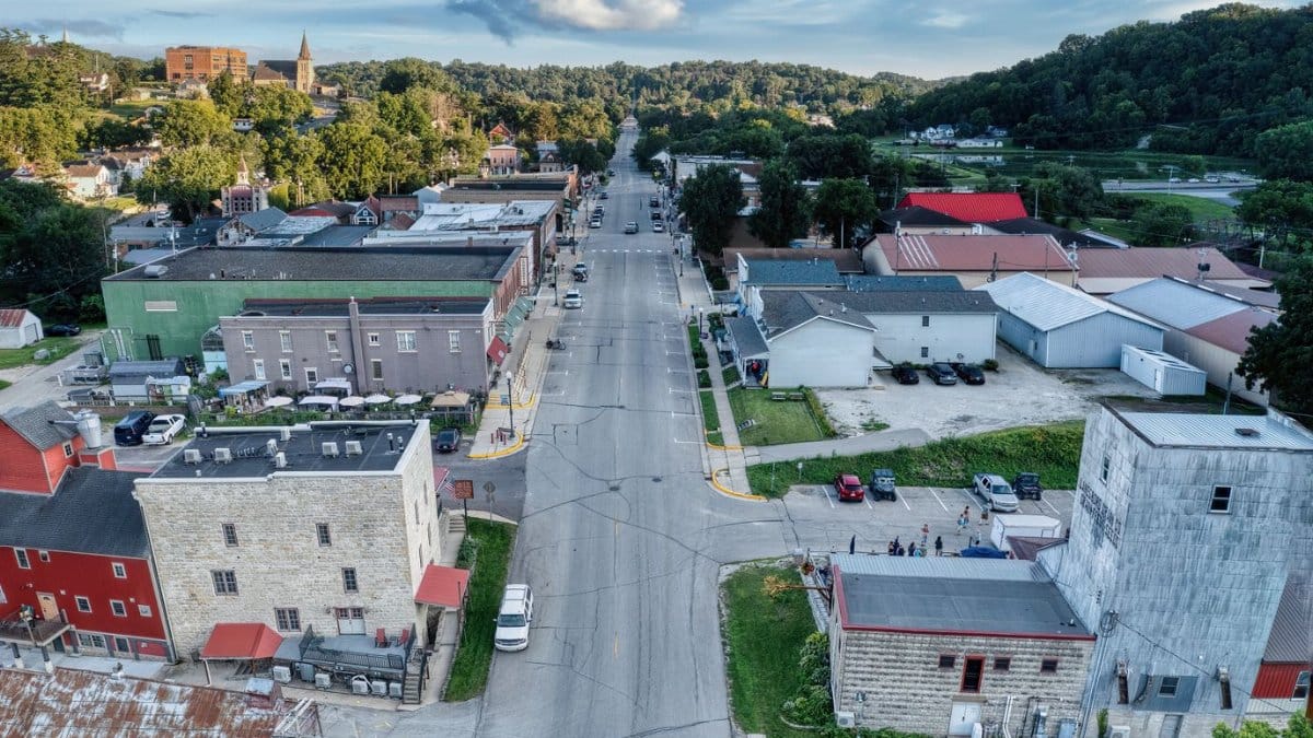 Aerial view of small town Lanesboro, Minnesota showcasing its charming downtown and surrounding greenery.