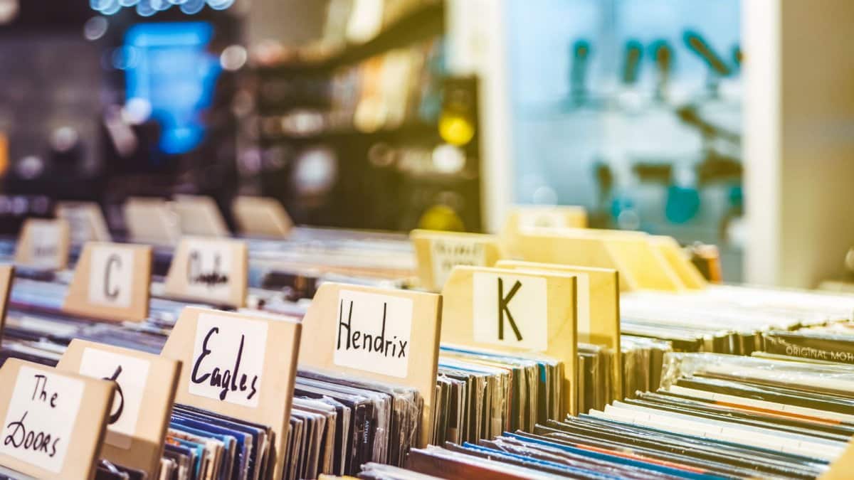 Explore the charm of a vintage vinyl record store with diverse classic albums on display.