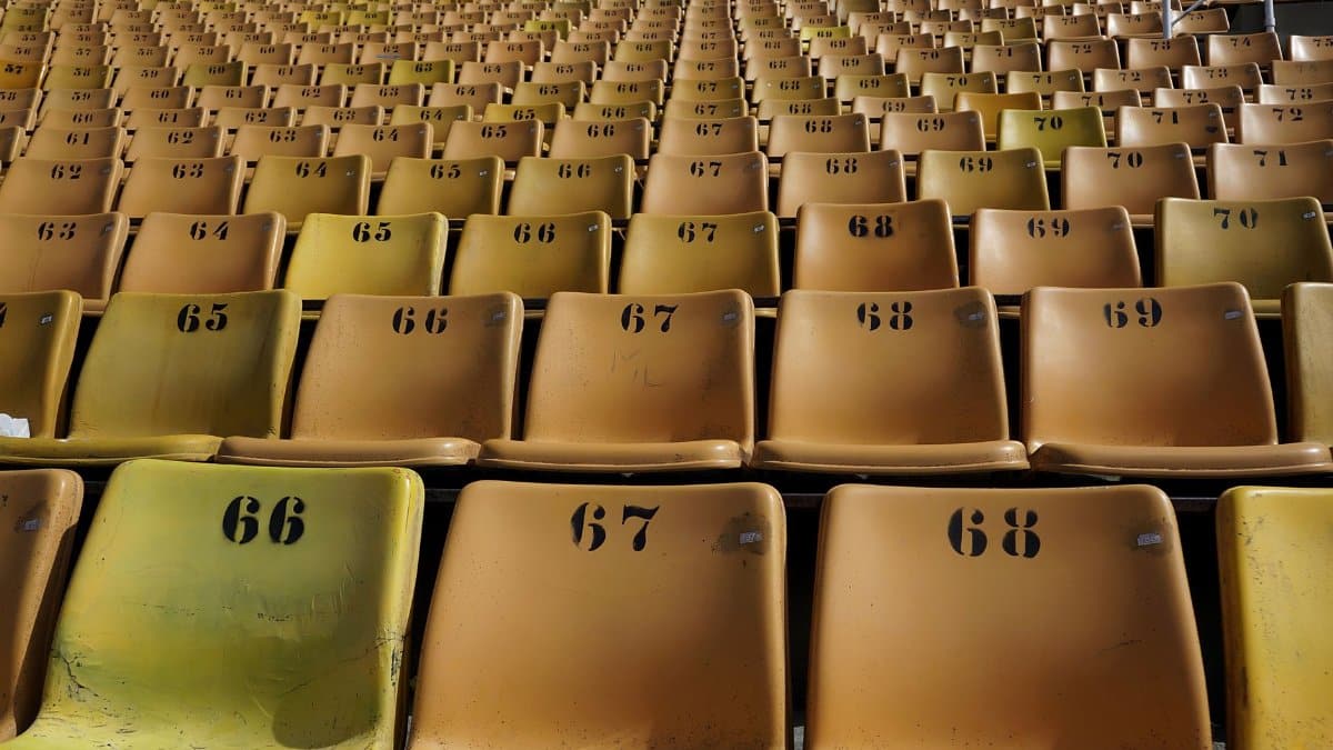 Rows of empty numbered seats at a stadium in São Paulo, ideal for sports or event photography.