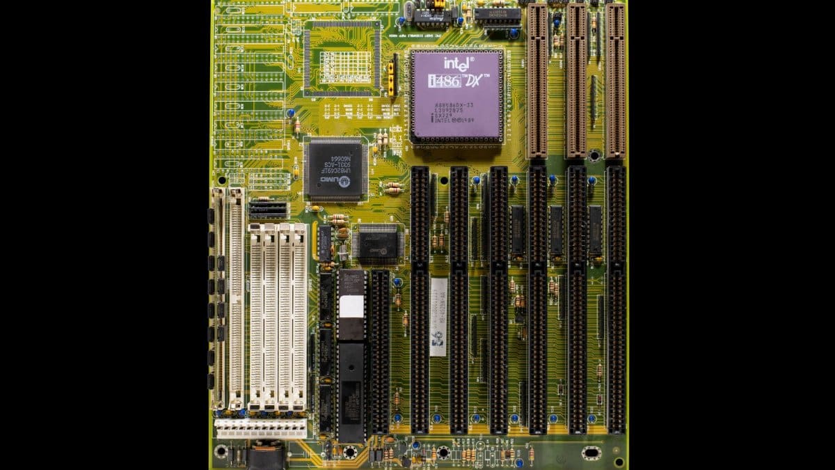 Old motherboard featuring an Intel i486 processor, showcasing retro computer technology.