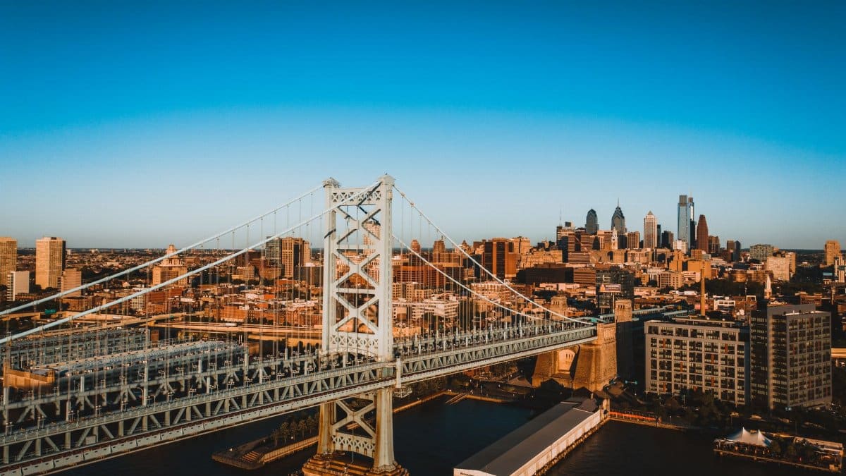 Drone view of city landmark Benjamin Franklin Bridge over Delaware River connecting cities of Philadelphia in America