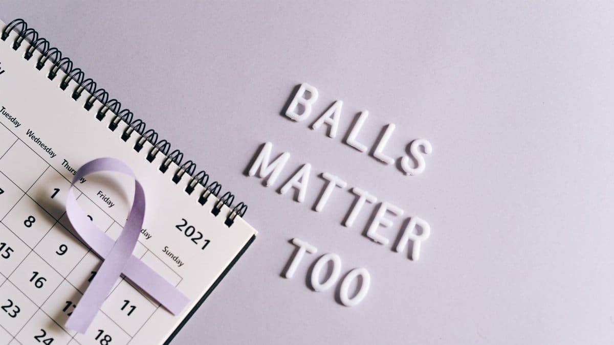 Calendar with purple ribbon and 'Balls Matter Too' text for testicular cancer awareness.