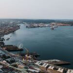 Explore Seattle's bustling waterfront with sweeping views of the port and city skyline.