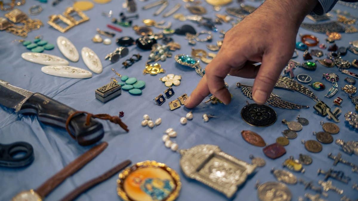 A diverse collection of jewelry and trinkets displayed at a bazaar in İstanbul, Türkiye.