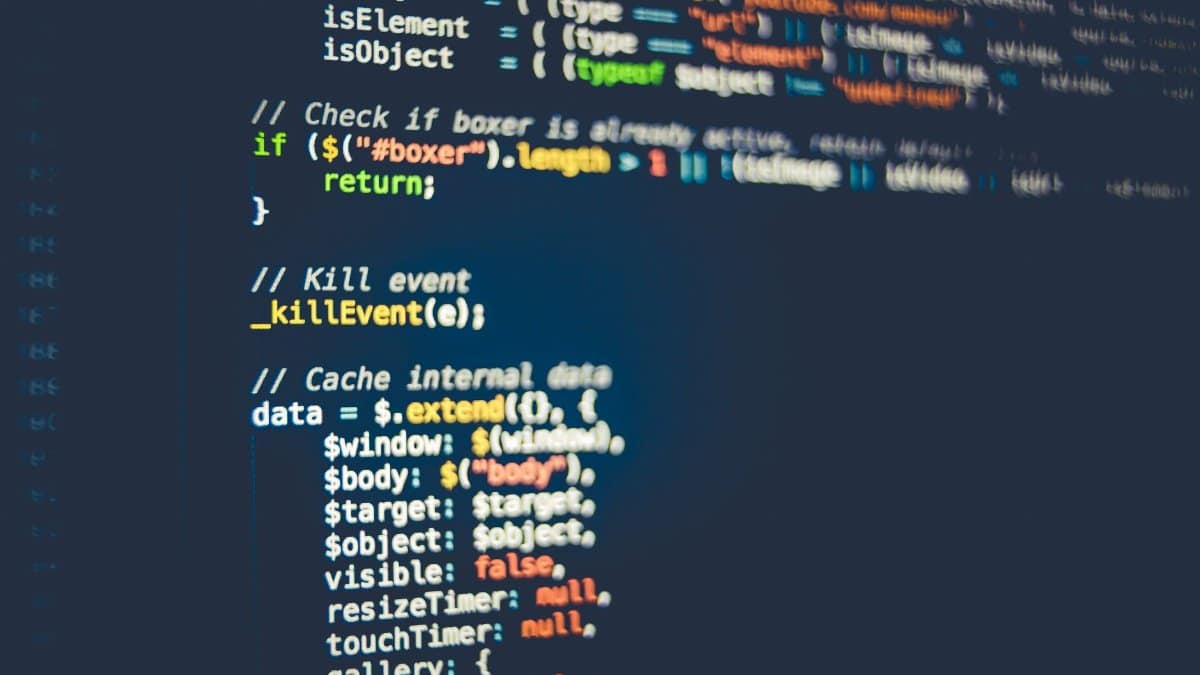 Close-up of colorful programming code displayed on a computer screen, showcasing modern coding concepts.