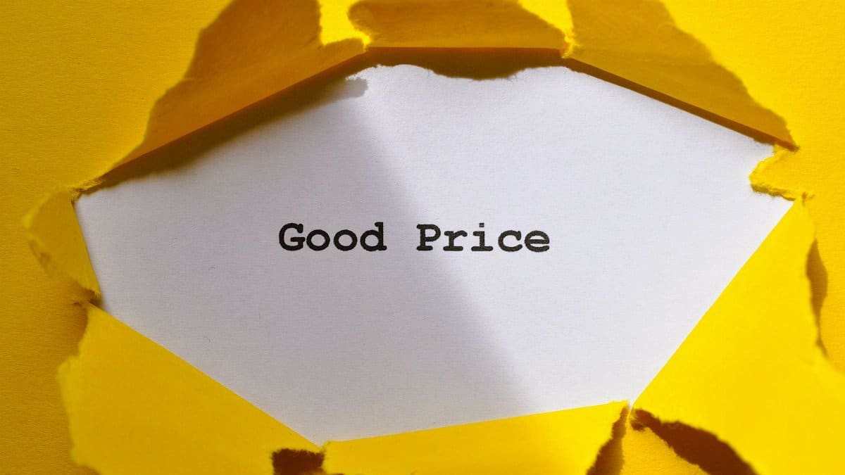 Yellow paper torn to reveal 'Good Price'. Perfect for sales and marketing concepts.