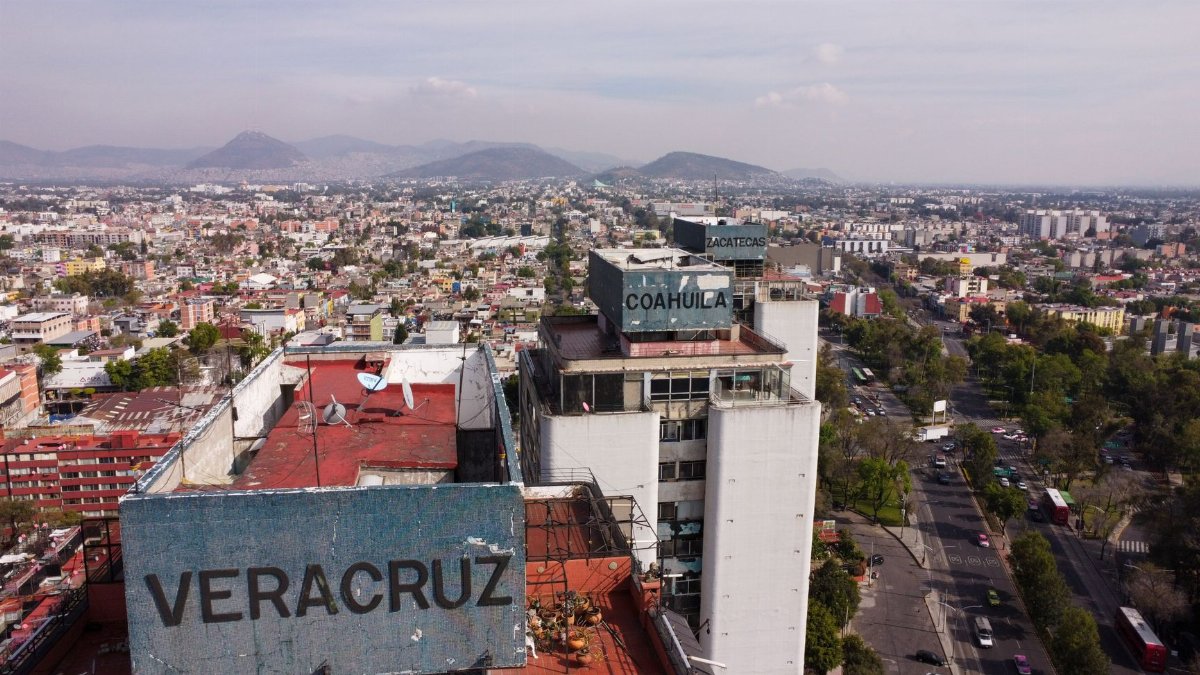 Aerial view of the Veracruz building in Mexico City, showcasing urban landscape and skyline.