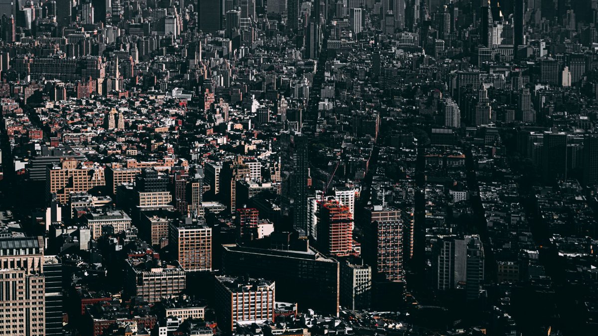 A stunning aerial shot of Manhattan's skyscrapers and urban landscape in New York City.
