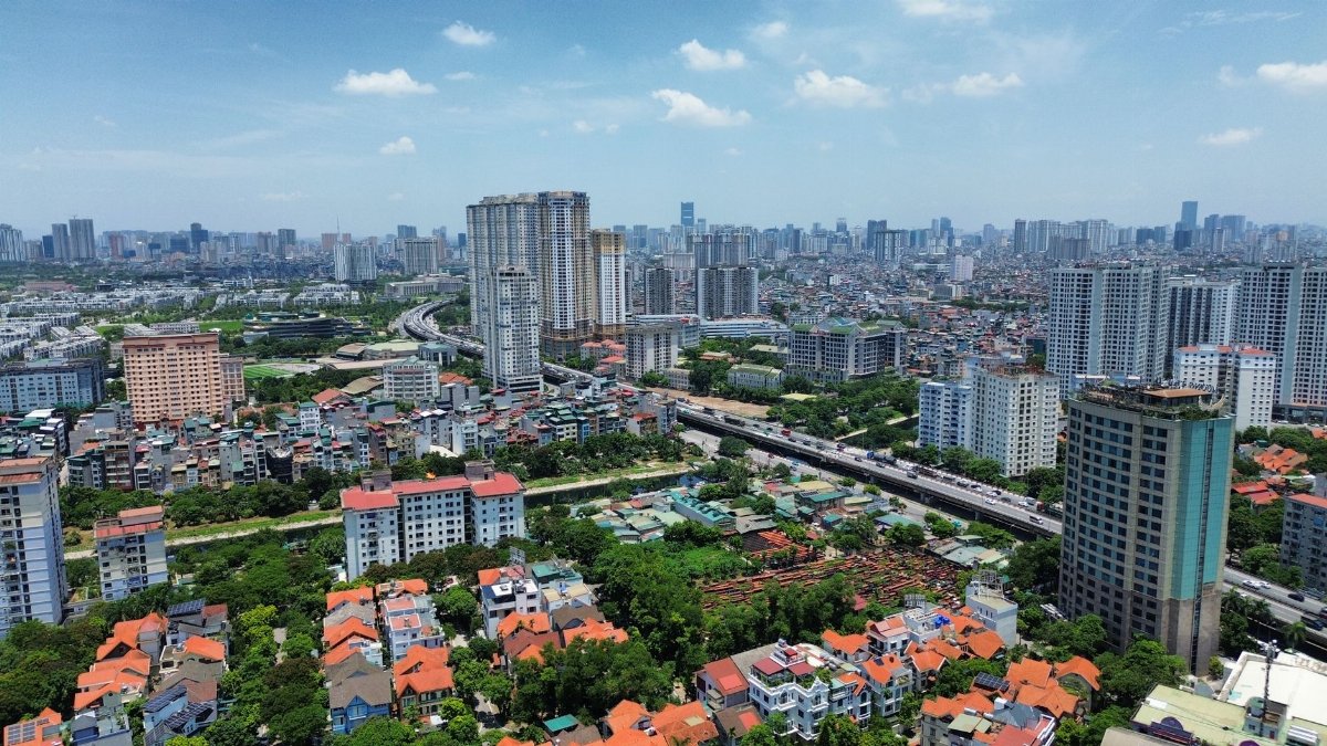Aerial view of Hà Nội with residential and commercial buildings showcasing urban density.