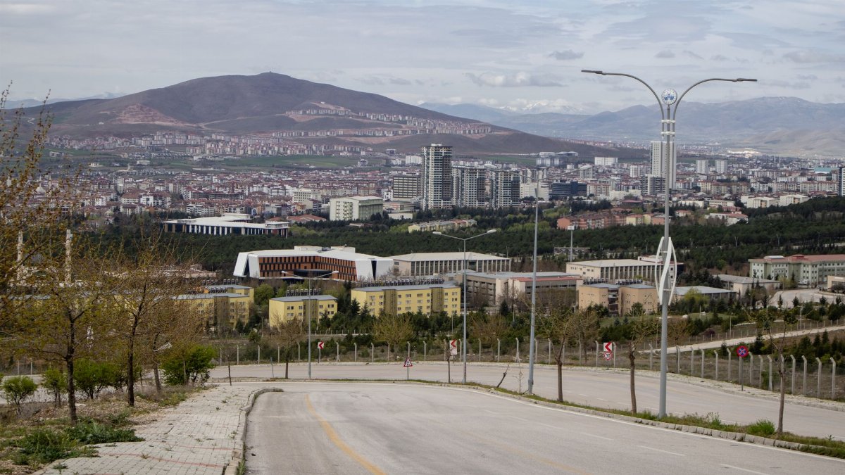 A panoramic view of Elâzığ city with mountains in the background, showcasing urban development.