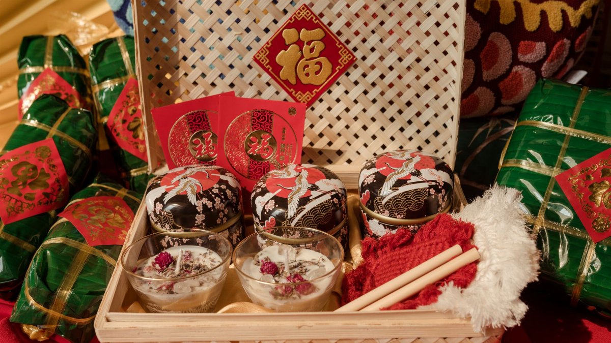 A vibrant display of a traditional Tet gift basket with food and ornaments, perfect for cultural celebrations.