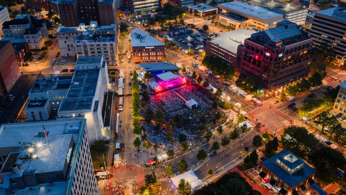 Drone shot capturing a vibrant night festival in downtown Chattanooga, Tennessee.