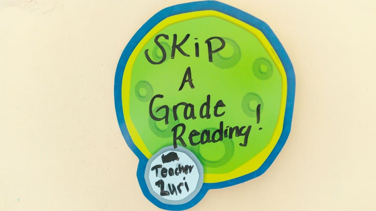 Colorful sign with 'Skip a Grade Reading' promoting educational advancement.