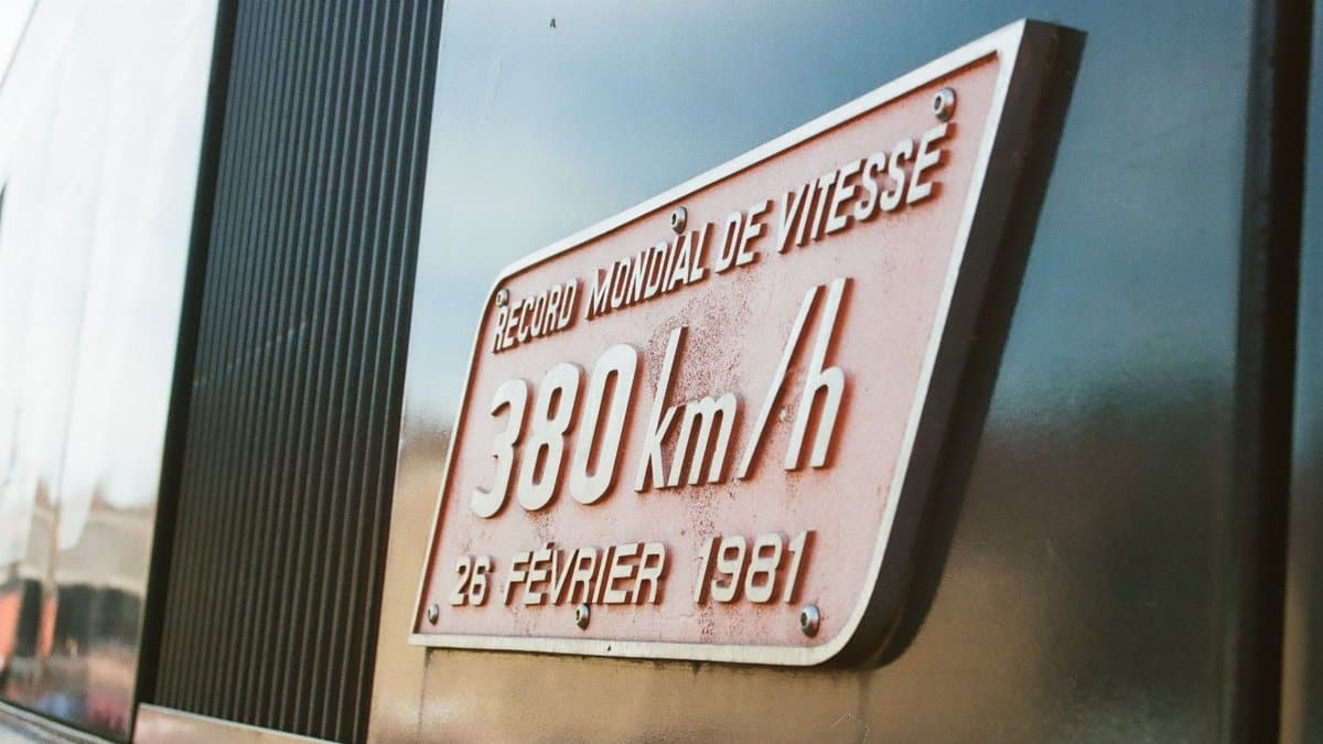 Close-up of a TGV speed record plaque from 1981, showcasing 380 km/h.