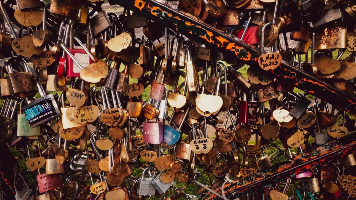 A bridge adorned with numerous heart-shaped locks, symbolizing love and commitment. Ideal for themes of romance.