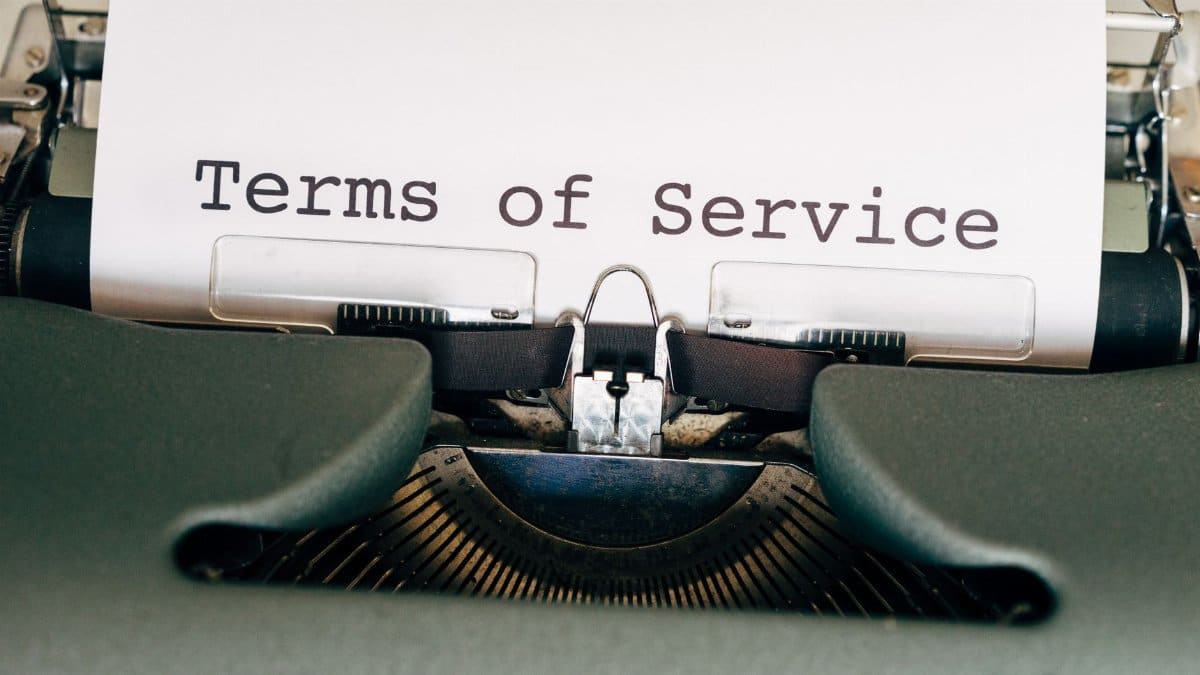 A vintage typewriter with a paper displaying 'Terms of Service'. Perfect for business or legal themes.