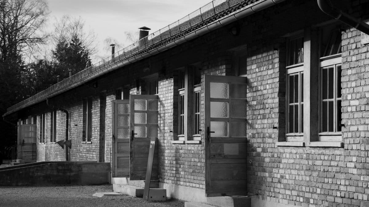 Black and white photo of a historic brick building in Dachau, Bavaria.
