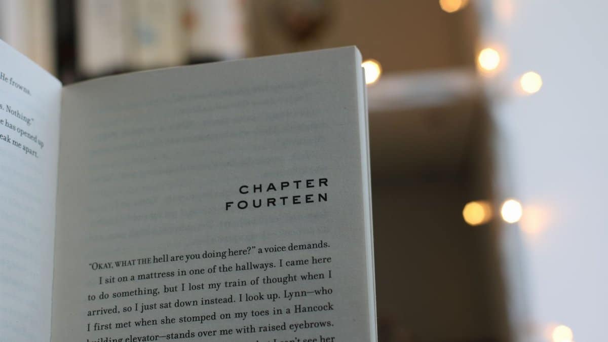 Close-up of a book page with chapter fourteen, perfect for book lovers and cozy reading themes.