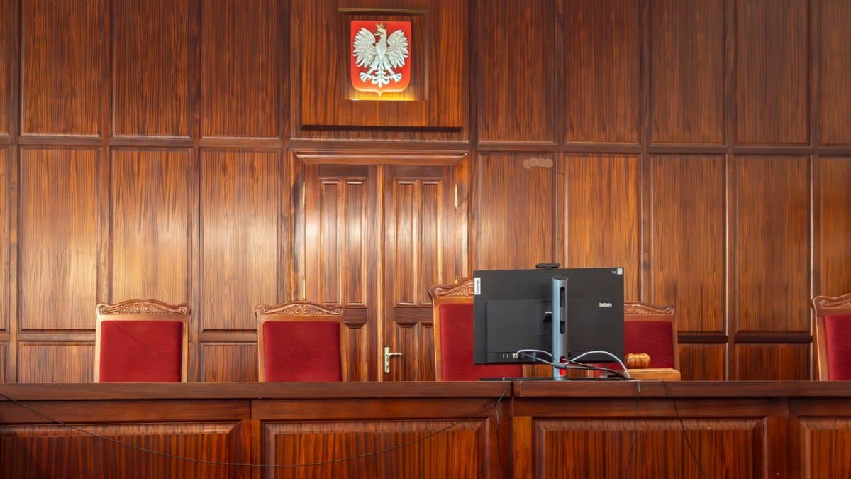 A beautifully crafted wooden courtroom with the Polish emblem in Wrocław, Poland.