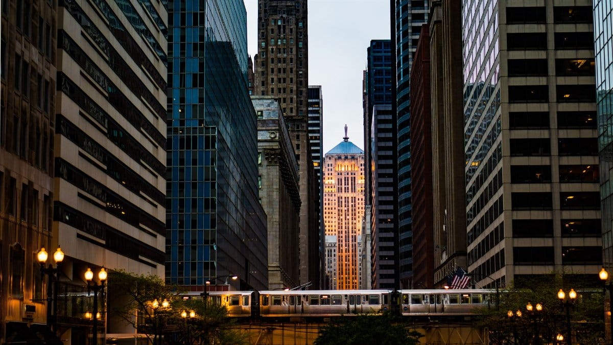 Captivating view of Chicago's downtown skyscrapers with an elevated train passing through.