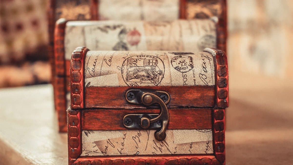 Close-up of an ornate wooden chest with vintage design elements, ideal for decoration.
